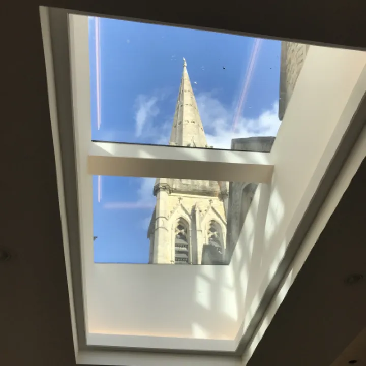 Spire through skylights