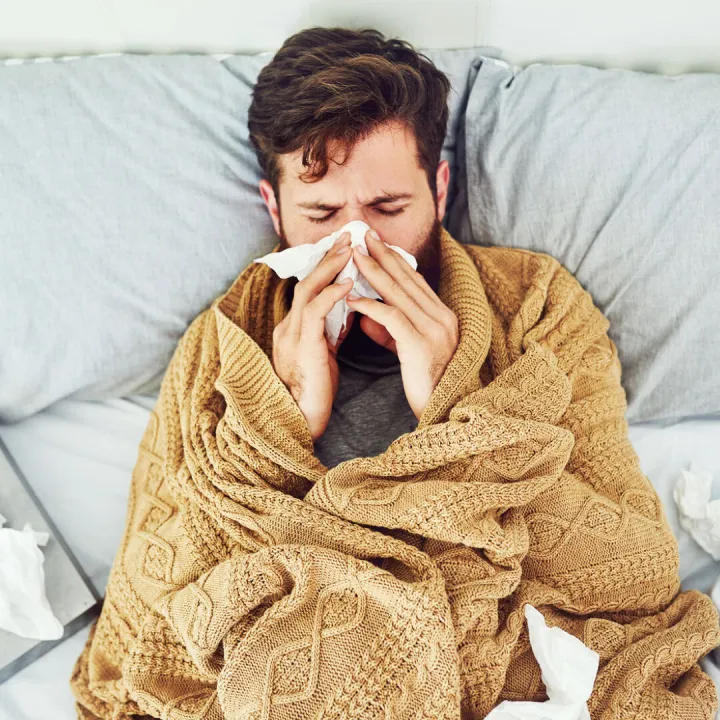 Man in Bed With Flu