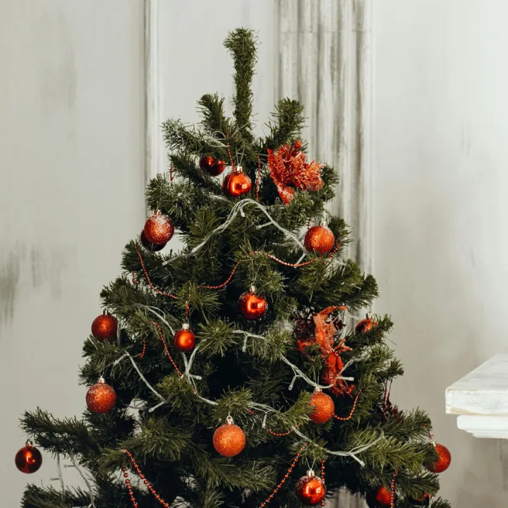 Decorated Christmas tree with red ornaments and