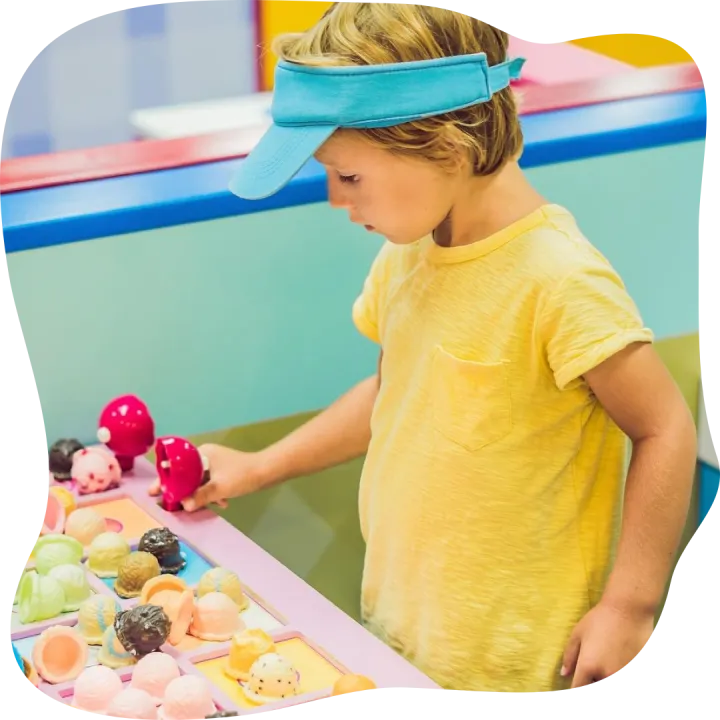 Children play as ice cream seller.