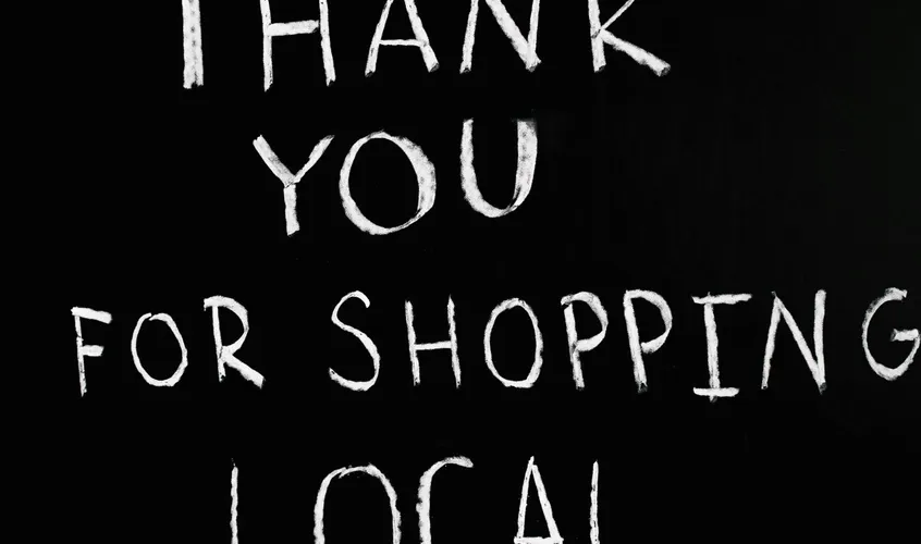 A chalkboard with handwritten message thanking