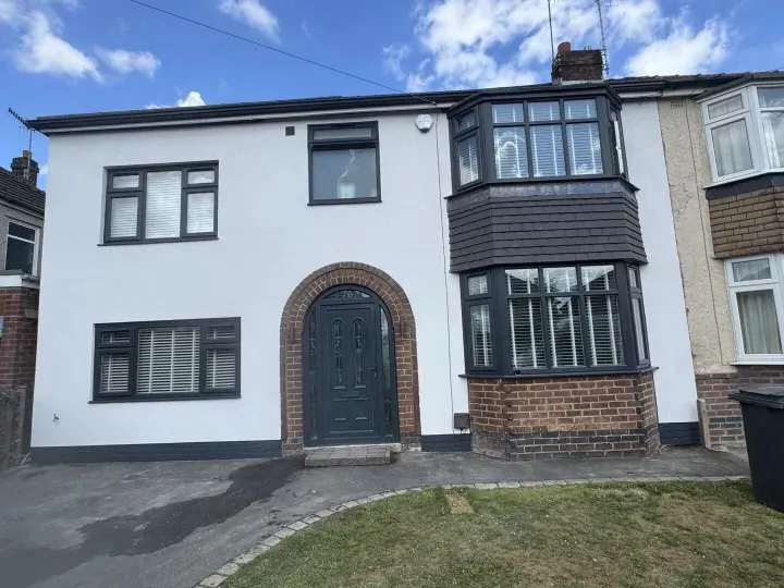 Semi-detached house after silicone rendering
