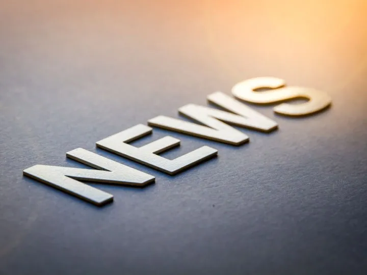 Word news written with white solid letters