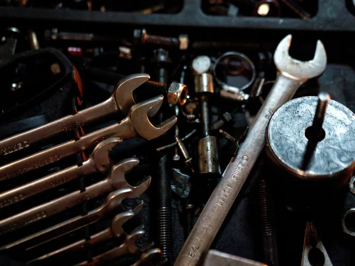 Detailed view of scattered wrenches and metal