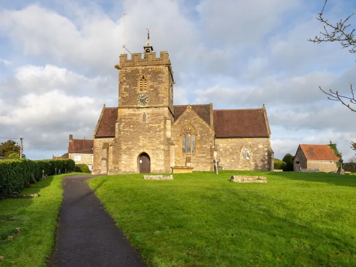A church with a bell tower on a summer day