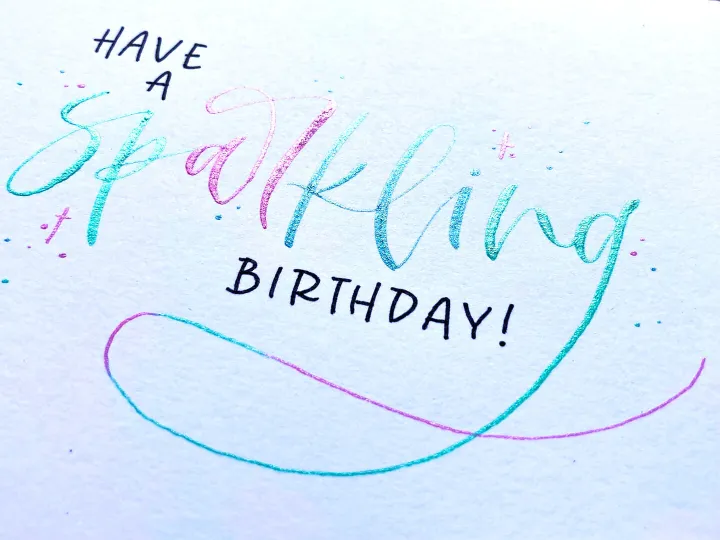 Have a sparkling birthday card in pink and turquoise brush lettering