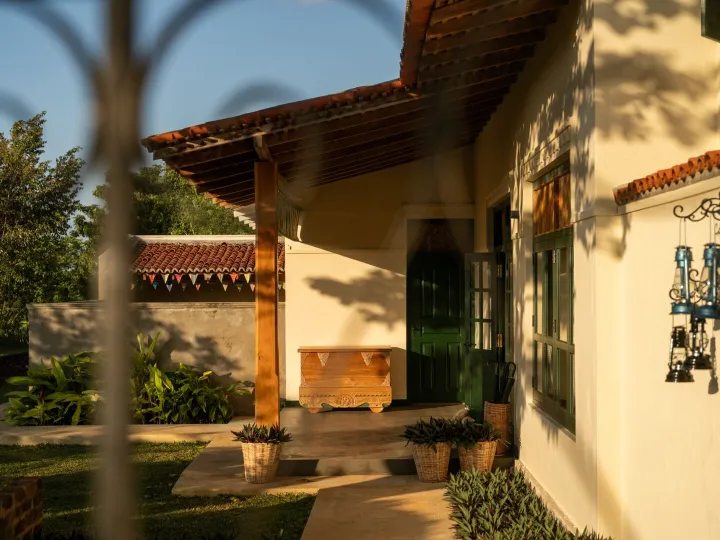 The villa and its veranda seen from the garden gate at Peacock Hill Sigiriya