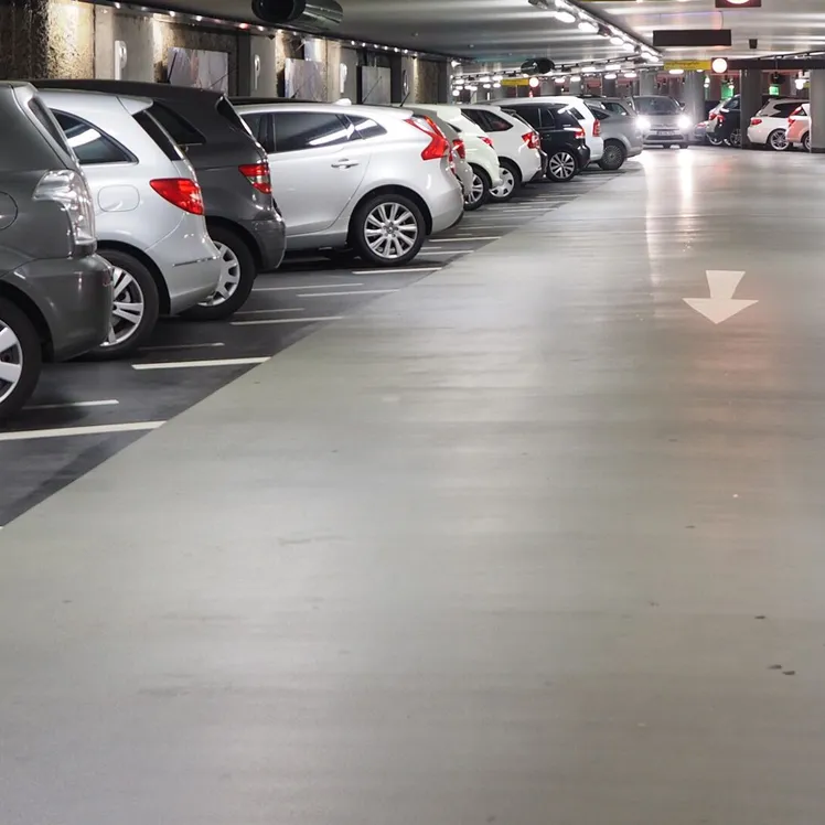 Multi-storey car park with cars and line painting