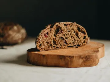 Slice of tasty homemade sourdough cranberry whole