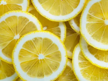 Closeup of slices of lemon textured background