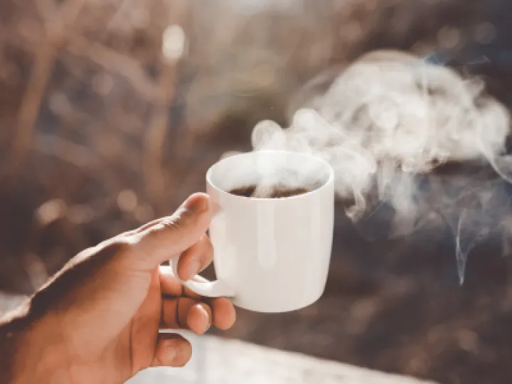 steaming coffee mug clay-banks-_wkd7XBRfU4-unsplash