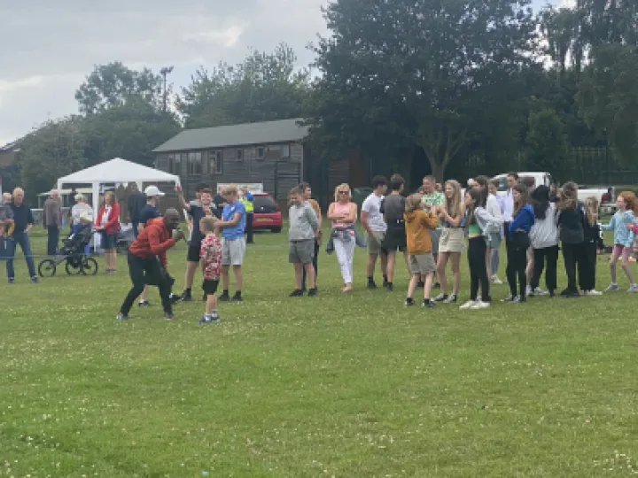 Summer fete 2023 Francis leading the fun and games