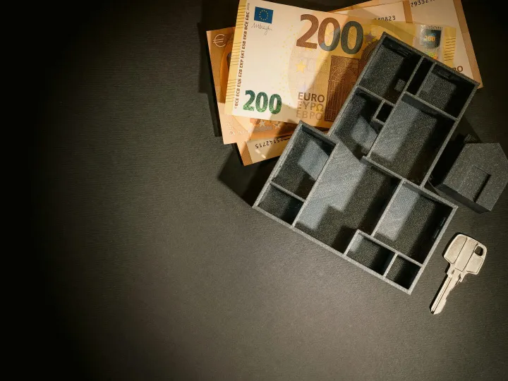 A top view of euro banknotes, a miniature architec